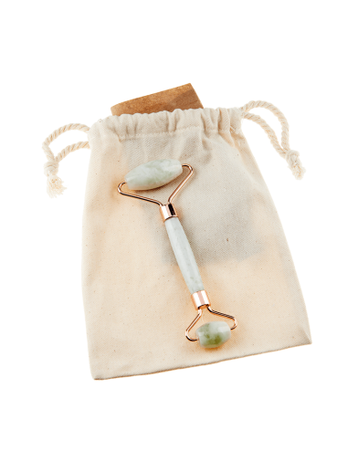 Rouleau de massage visage en pierre de Jade vendu dans un grand sac en coton